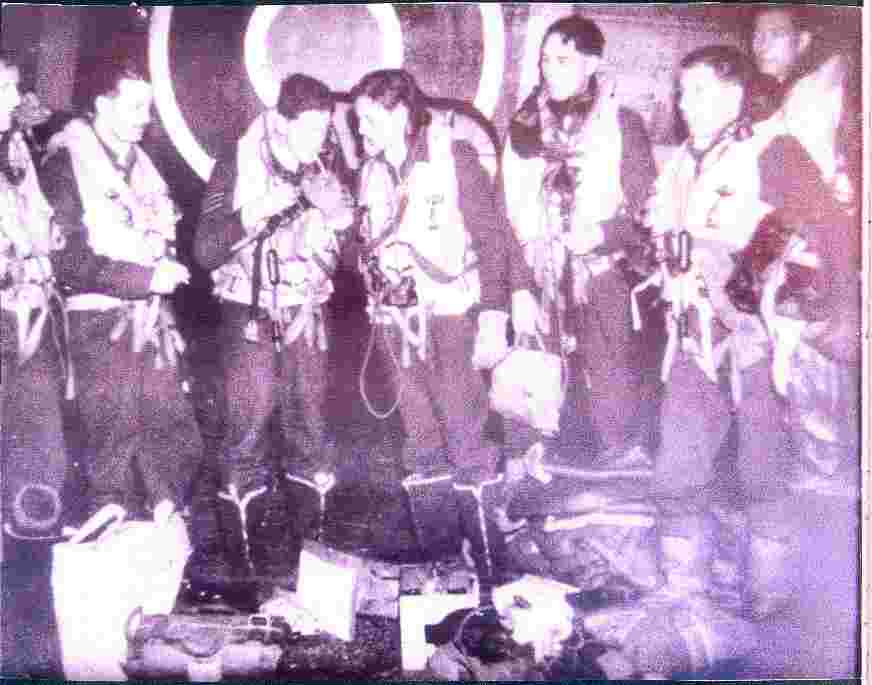 Sir Knight and Bro. Orangeman George Simpson is second on the right. The rest of the crew are believed to be Canadians with a possible girl member fourth from the right