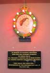 The memorial plaque is in the main hall on a inside wall
